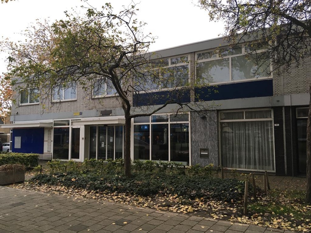 Ombouw van oud-bankkantoor naar negen appartementen