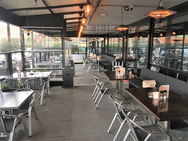 Bij Haifa zit je ook bij koud weer nu warm op het terras