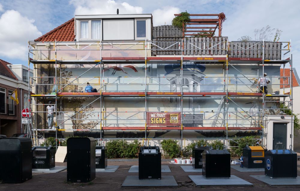 Onthulling muurschildering in de Nieuwe Buurt